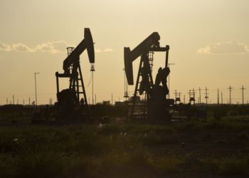 Oil settles lower as investors brace for possible OPEC+ output hike