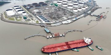 Oil slips on oversupply concerns, stronger dollar